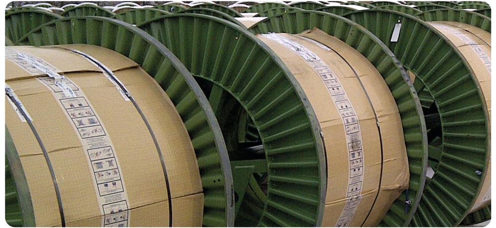 Nolco Flex Protective Sleeve in Use - See the impact of the rugged Nolco Flex system in packaging large cable drums.